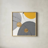 Golden Orbs II by Chris Paschke. Shown in a natural wood glass frame for a timeless modern aesthetic. Available as an archival giclee rolled canvas, fine art paper, or poster print. SKU 88079a.