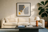 Golden Orbs III by Chris Paschke. Displayed in a glass frame with matte in a clean modern living room. Available as an archival giclee rolled canvas, fine art paper, or poster print. SKU 88080a.