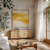 Golden Reflection I by Chris Paschke. Shown in a natural wood frame in a cozy modern living room. Available as an archival giclee rolled canvas, fine art paper, or poster print. SKU 39673a.