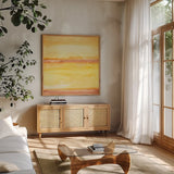 Golden Sands III by Chris Paschke. Shown in a natural wood frame in a cozy modern living room. Available as an archival giclee rolled canvas, fine art paper, or poster print. SKU 65476a.