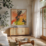 Graffiti Orange I by Chris Paschke. Shown in a natural wood frame in a cozy modern living room. Available as an archival giclee rolled canvas, fine art paper, or poster print. SKU 44542a.