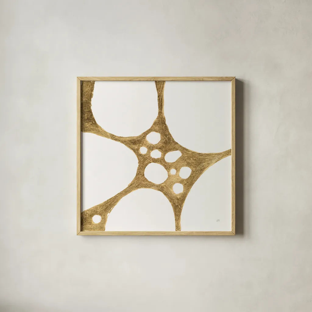 Graphic Gold II by Chris Paschke. Shown in a natural wood glass frame for a timeless modern aesthetic. Available as an archival giclee rolled canvas, fine art paper, or poster print. SKU 91427a.