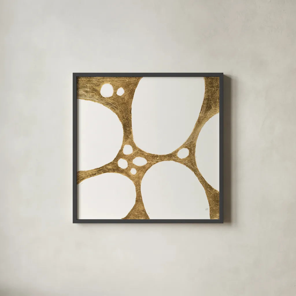 Graphic Gold IV by Chris Paschke. Shown in a sleek black glass frame for a contemporary gallery look. Available as an archival giclee rolled canvas, fine art paper, or poster print. SKU 91429a.