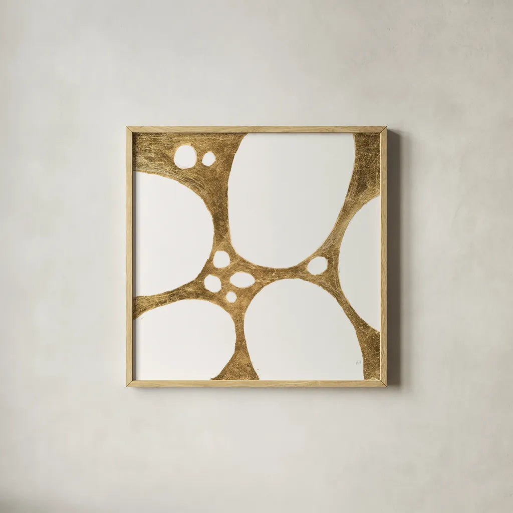 Graphic Gold IV by Chris Paschke. Shown in a natural wood glass frame for a timeless modern aesthetic. Available as an archival giclee rolled canvas, fine art paper, or poster print. SKU 91429a.