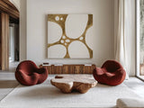 Graphic Gold IV by Chris Paschke. Shown as extra-large giant wall art in a modern living room. Available as an archival giclee rolled canvas, fine art paper, or poster print. SKU 91429a.