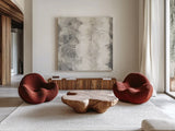 Gray Circles I by Chris Paschke. Shown as extra-large giant wall art in a modern living room. Available as an archival giclee rolled canvas, fine art paper, or poster print. SKU 16884a.