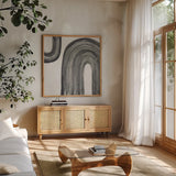 Gray Rainbow I by Chris Paschke. Shown in a natural wood frame in a cozy modern living room. Available as an archival giclee rolled canvas, fine art paper, or poster print. SKU 69556a.