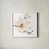 Greige Magnolias I by Chris Paschke. Shown in a crisp white glass frame for a clean and minimalist style. Available as an archival giclee rolled canvas, fine art paper, or poster print. SKU 88344a.