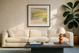 Grey Stone I by Chris Paschke. Displayed in a glass frame with matte in a clean modern living room. Available as an archival giclee rolled canvas, fine art paper, or poster print. SKU 19801a.