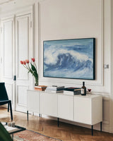 In the Blue II by Chris Paschke. shown as a framed stretched canvas in a living room above a console. Available as a archival giclee rolled canvas, fine art paper, or poster print. SKU 61470i.