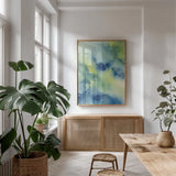 Indigo Flow II by Chris Paschke. shown as a print in a natural wood frame in a dining room. Available as a archival giclee rolled canvas, fine art paper, or poster print. SKU 49050h.