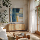 Indigo VI by Chris Paschke. Shown in a natural wood frame in a cozy modern living room. Available as an archival giclee rolled canvas, fine art paper, or poster print. SKU 15138a.