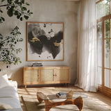 Ink Splash II by Chris Paschke. Shown in a natural wood frame in a cozy modern living room. Available as an archival giclee rolled canvas, fine art paper, or poster print. SKU 99397a.