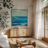 Inlet by Chris Paschke. Shown in a natural wood frame in a cozy modern living room. Available as an archival giclee rolled canvas, fine art paper, or poster print. SKU 14962a.
