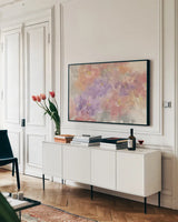 Intimate Freesia by Chris Paschke. shown as a framed stretched canvas in a living room above a console. Available as a archival giclee rolled canvas, fine art paper, or poster print. SKU 50271i.