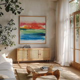 Jewel Waterway II by Chris Paschke. Shown in a natural wood frame in a cozy modern living room. Available as an archival giclee rolled canvas, fine art paper, or poster print. SKU 80128a.