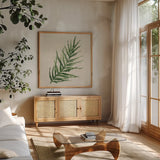 Kozo Fern VIII by Chris Paschke. Shown in a natural wood frame in a cozy modern living room. Available as an archival giclee rolled canvas, fine art paper, or poster print. SKU 95421a.