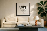Laundry Room III White by Chris Paschke. Displayed in a glass frame with matte in a clean modern living room. Available as an archival giclee rolled canvas, fine art paper, or poster print. SKU 65517a.