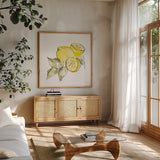 Lemon Still Life I by Chris Paschke. Shown in a natural wood frame in a cozy modern living room. Available as an archival giclee rolled canvas, fine art paper, or poster print. SKU 66880a.