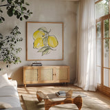 Lemons III by Chris Paschke. Shown in a natural wood frame in a cozy modern living room. Available as an archival giclee rolled canvas, fine art paper, or poster print. SKU 66878a.