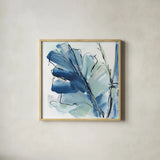 Luxe Banana Leaf I by Chris Paschke. Shown in a natural wood glass frame for a timeless modern aesthetic. Available as an archival giclee rolled canvas, fine art paper, or poster print. SKU 84576a.