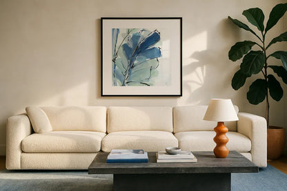Luxe Banana Leaf II by Chris Paschke. Displayed in a glass frame with matte in a clean modern living room. Available as an archival giclee rolled canvas, fine art paper, or poster print. SKU 84577a.