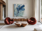 Luxe Banana Leaf II by Chris Paschke. Shown as extra-large giant wall art in a modern living room. Available as an archival giclee rolled canvas, fine art paper, or poster print. SKU 84577a.