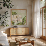 Magnolia I by Chris Paschke. Shown in a natural wood frame in a cozy modern living room. Available as an archival giclee rolled canvas, fine art paper, or poster print. SKU 39215a.