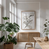 Magnolia II by Chris Paschke. shown as a print in a natural wood frame in a dining room. Available as a archival giclee rolled canvas, fine art paper, or poster print. SKU 74367h.