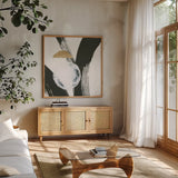 Many Moons III by Chris Paschke. Shown in a natural wood frame in a cozy modern living room. Available as an archival giclee rolled canvas, fine art paper, or poster print. SKU 82406a.