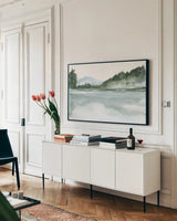 Mountain Lake by Chris Paschke. shown as a framed stretched canvas in a living room above a console. Available as a archival giclee rolled canvas, fine art paper, or poster print. SKU 83111i.
