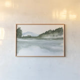 Mountain Lake by Chris Paschke. shown as a paper print in a natural frame. Available as a archival giclee rolled canvas, fine art paper, or poster print. SKU 83111i.