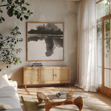 Mountain Reflection by Chris Paschke. Shown in a natural wood frame in a cozy modern living room. Available as an archival giclee rolled canvas, fine art paper, or poster print. SKU 74361a.