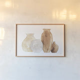 Neutral Vases III by Chris Paschke. shown as a paper print in a natural frame. Available as a archival giclee rolled canvas, fine art paper, or poster print. SKU 75664i.