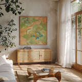 Olive Poppy II by Chris Paschke. Shown in a natural wood frame in a cozy modern living room. Available as an archival giclee rolled canvas, fine art paper, or poster print. SKU 50260a.