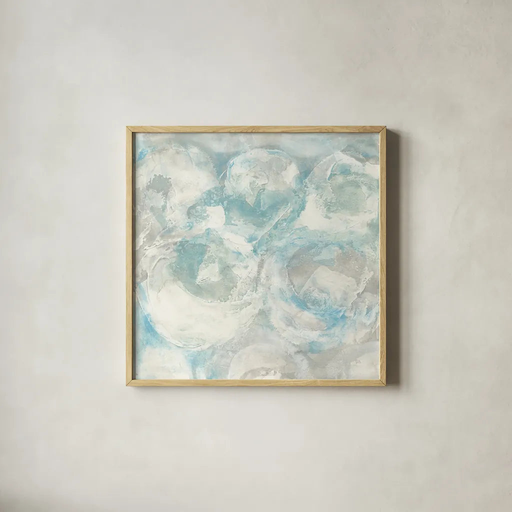 Pale Blue Circles III by Chris Paschke. Shown in a natural wood glass frame for a timeless modern aesthetic. Available as an archival giclee rolled canvas, fine art paper, or poster print. SKU 35257a.