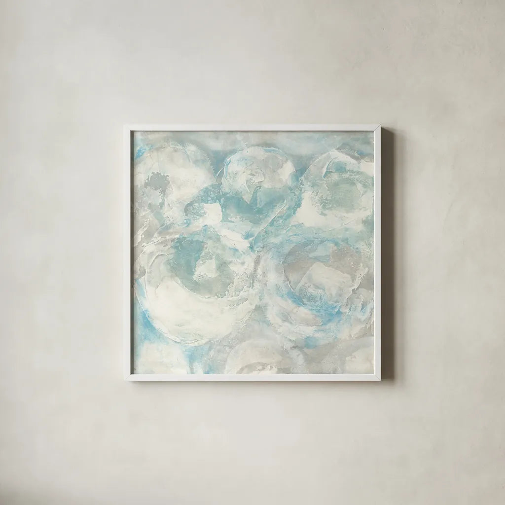 Pale Blue Circles III by Chris Paschke. Shown in a crisp white glass frame for a clean and minimalist style. Available as an archival giclee rolled canvas, fine art paper, or poster print. SKU 35257a.