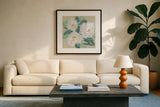 Peonies on Cream I by Chris Paschke. Displayed in a glass frame with matte in a clean modern living room. Available as an archival giclee rolled canvas, fine art paper, or poster print. SKU 80828a.