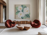 Peonies on Cream I by Chris Paschke. Shown as extra-large giant wall art in a modern living room. Available as an archival giclee rolled canvas, fine art paper, or poster print. SKU 80828a.
