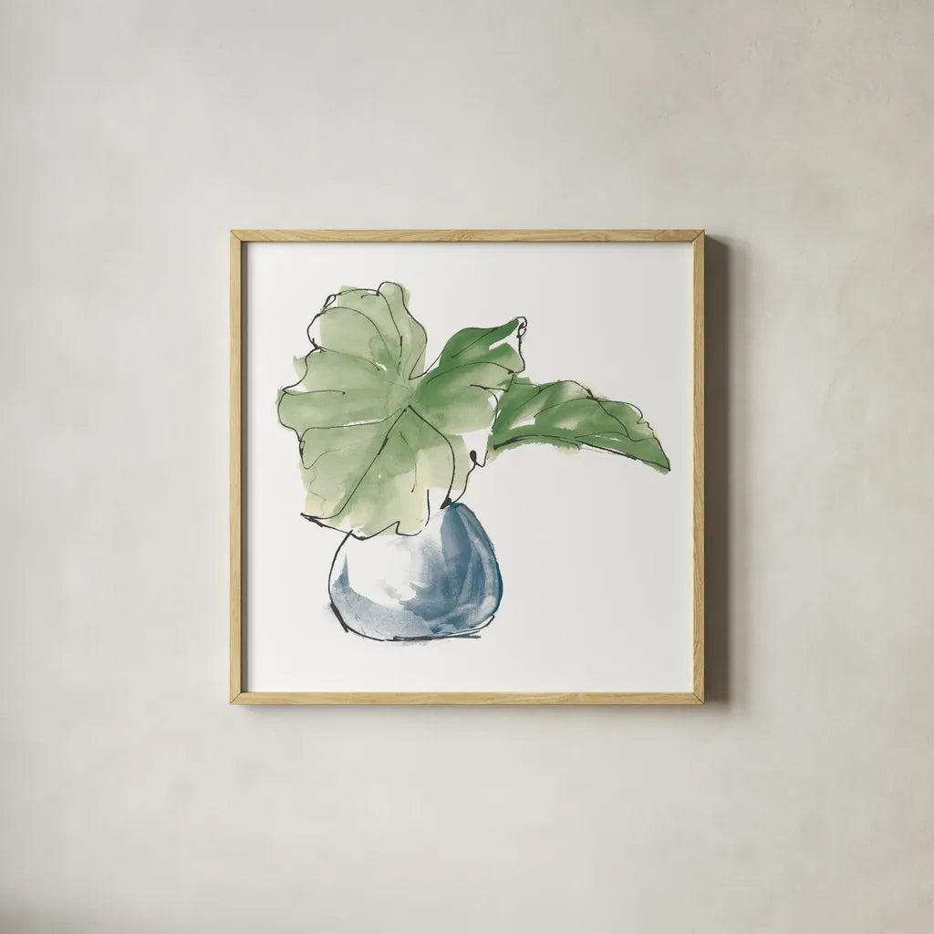 Plant Big Leaf I Dark Green by Chris Paschke. Shown in a natural wood glass frame for a timeless modern aesthetic. Available as an archival giclee rolled canvas, fine art paper, or poster print. SKU 56346a.