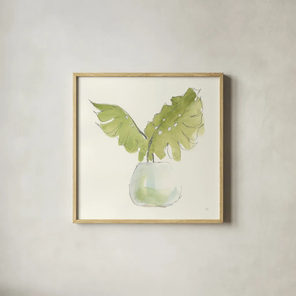 Plant Big Leaf II by Chris Paschke. Shown in a natural wood glass frame for a timeless modern aesthetic. Available as an archival giclee rolled canvas, fine art paper, or poster print. SKU 55027a.