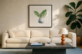 Plant Big Leaf II Dark Green by Chris Paschke. Displayed in a glass frame with matte in a clean modern living room. Available as an archival giclee rolled canvas, fine art paper, or poster print. SKU 56347a.