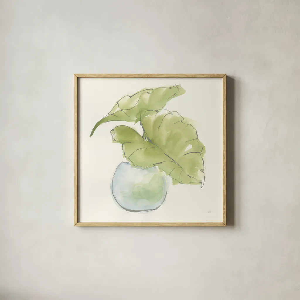 Plant Big Leaf III by Chris Paschke. Shown in a natural wood glass frame for a timeless modern aesthetic. Available as an archival giclee rolled canvas, fine art paper, or poster print. SKU 55028a.