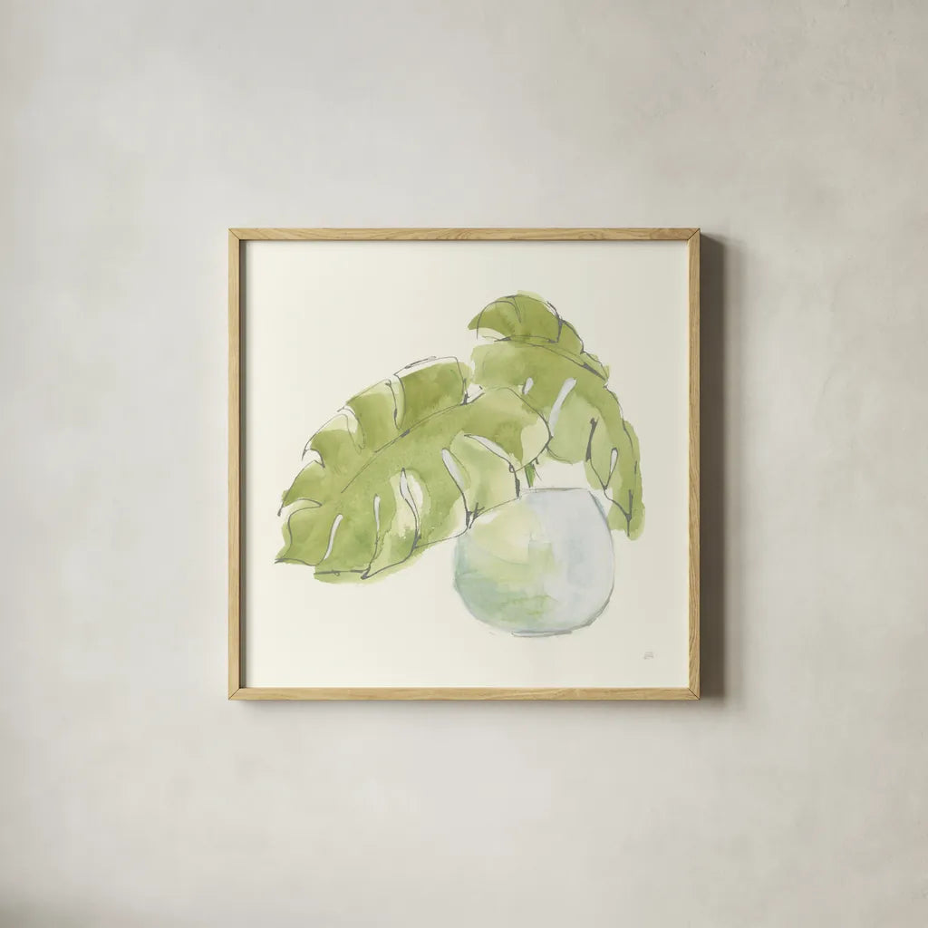 Plant Big Leaf IV by Chris Paschke. Shown in a natural wood glass frame for a timeless modern aesthetic. Available as an archival giclee rolled canvas, fine art paper, or poster print. SKU 55029a.