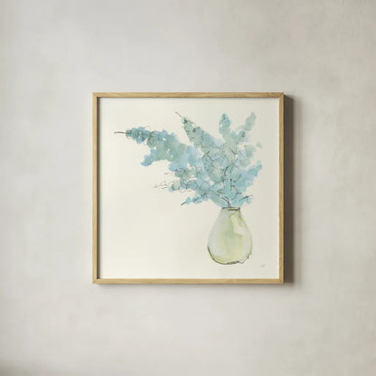 Plant Eucalyptus I by Chris Paschke. Shown in a natural wood glass frame for a timeless modern aesthetic. Available as an archival giclee rolled canvas, fine art paper, or poster print. SKU 55033a.