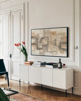 Platinum Neutrals I by Chris Paschke. shown as a framed stretched canvas in a living room above a console. Available as a archival giclee rolled canvas, fine art paper, or poster print. SKU 25648i.