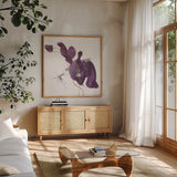 Plum and Gold II by Chris Paschke. Shown in a natural wood frame in a cozy modern living room. Available as an archival giclee rolled canvas, fine art paper, or poster print. SKU 91457a.