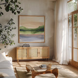 Pond View III by Chris Paschke. Shown in a natural wood frame in a cozy modern living room. Available as an archival giclee rolled canvas, fine art paper, or poster print. SKU 94403a.