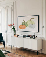 Pumpkin Menagerie II by Chris Paschke. shown as a framed stretched canvas in a living room above a console. Available as a archival giclee rolled canvas, fine art paper, or poster print. SKU 81881i.