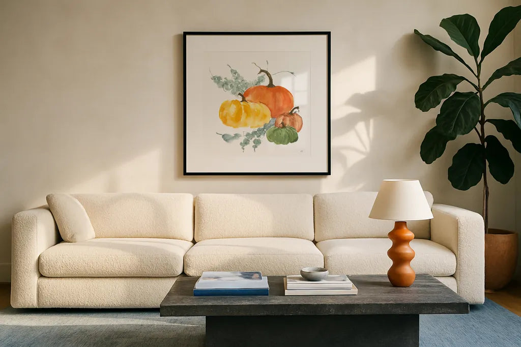 Pumpkins and Eucalyptus I by Chris Paschke. Displayed in a glass frame with matte in a clean modern living room. Available as an archival giclee rolled canvas, fine art paper, or poster print. SKU 81864a.